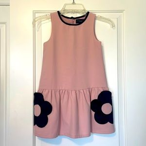 Pale pink dress with black daisy pockets